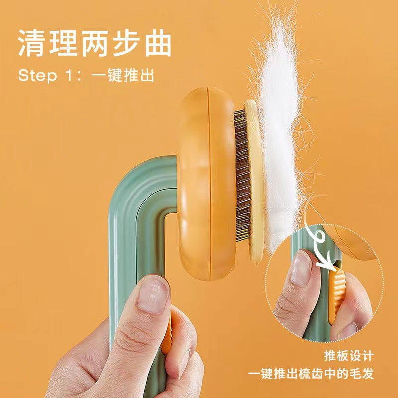Cross-border pet comb supplies stainless steel pumpkin cleaning needle comb set cats and dogs universal one-key de-floating brush